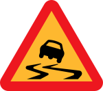 slippery road sign